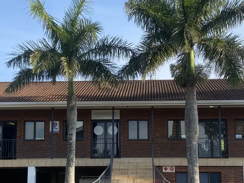 Palm-lined steps up to first-floor offices at Rey Park, Ballito